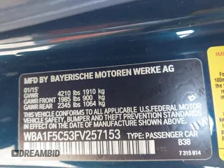 2015 BMW 2 Series 228i with VIN WBA1F5C53FV257153, listed as a IAAI auction lot 41294335 with 99,919 mi miles. Bid and sale history available at carsss.com. Image 9.
