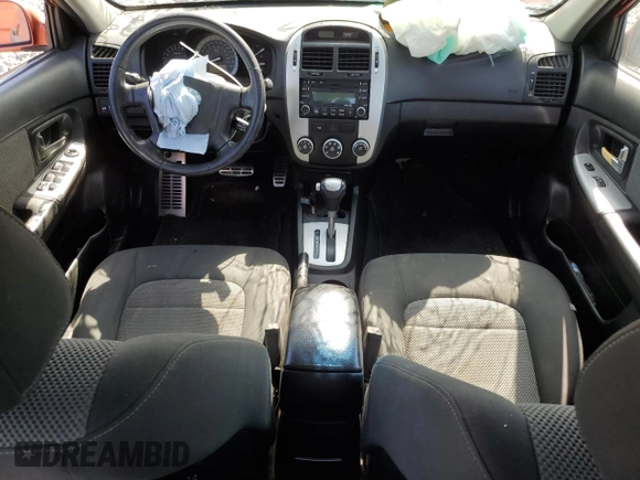 2009 Kia Spectra SX z VIN KNAFE221095025989, wystawiony jako Copart lot #57583155 z przebiegiem 261 776 mil mil oraz Szkoda całkowita • Salvage title. Historia ofert i sprzedaży dostępna na DreamBid. Obrazek 8.