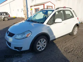2012 Suzuki SX4 Crossover with VIN JS2YB5A37C6301245, listed as a IAAI auction lot 41548580 with 122,601 mi miles and . Bid and sale history available at DreamBid. Image 2.