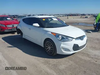 2017 Hyundai Veloster with VIN KMHTC6AD2HU309722, listed as a IAAI auction lot 41476969 with 125,155 mi miles. Bid and sale history available at carsss.com. Image 1.