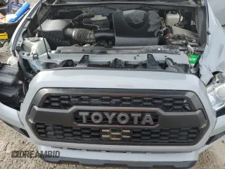 2019 Toyota Tacoma SR z VIN 3TMCZ5AN9KM206637, wystawiony jako Copart lot #48753665 z przebiegiem 88 864 mil mil oraz Szkoda całkowita • Salvage title. Historia ofert i sprzedaży dostępna na DreamBid. Obrazek 12.