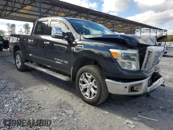 2016 Nissan Titan XD PRO-4X with VIN 1N6BA1F40GN510168, listed as a Copart auction lot 81030354 with 224,093 mi miles and Salvage Title. Bid and sale history available at carsss.com. Image 4.