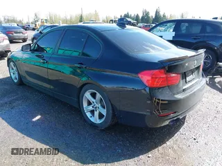 2013 BMW 3 Series 328i with VIN WBA3C1C58DF438654, listed as a IAAI auction lot 41992860 with 151,351 mi miles. Bid and sale history available at carsss.com. Image 3.