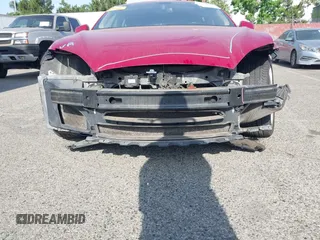 2014 Tesla Model S 60 z VIN 5YJSA1H16EFP42727, wystawiony jako IAAI lot #42544475 z przebiegiem 166 877 mil mil oraz . Historia ofert i sprzedaży dostępna na DreamBid. Obrazek 6.