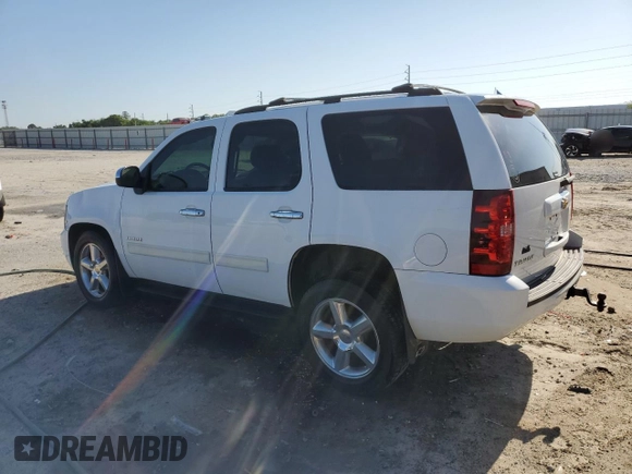 2013 Chevrolet Tahoe LS with VIN 1GNSCAE09DR117843, listed as a Copart auction lot 52773565 with 160,226 mi miles and Salvage title. Bid and sale history available at DreamBid. Image 2.