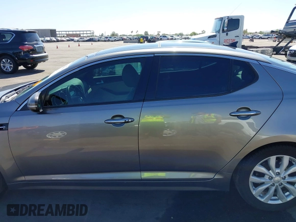 2014 Kia Optima EX z VIN 5XXGN4A72EG339786, wystawiony jako IAAI lot #42328516 z przebiegiem 103 035 mil mil oraz . Historia ofert i sprzedaży dostępna na DreamBid. Obrazek 15.