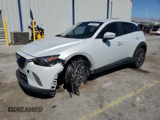 2018 Mazda CX-3 Touring z VIN JM1DKFC74J0312864, wystawiony jako Copart lot #55862845 z przebiegiem 75 584 mil mil oraz Szkoda całkowita • Salvage title. Historia ofert i sprzedaży dostępna na DreamBid. Obrazek 1.