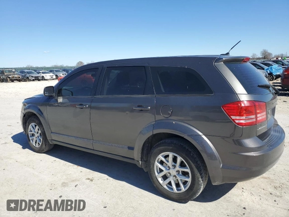 2015 Dodge Journey American Value with VIN 3C4PDCAB2FT538201, listed as a Copart auction lot 47058615 with 135,280 mi miles and Salvage Title. Bid and sale history available at DreamBid. Image 2.