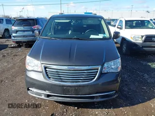 2016 Chrysler Town & Country Touring with VIN 2C4RC1BG5GR207496, listed as a IAAI auction lot 41908883 with 68,910 mi miles. Bid and sale history available at carsss.com. Image 12.