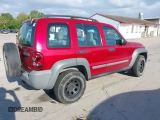 2005 Jeep Liberty Sport with VIN 1J4GL48K95W662399, listed as a IAAI auction lot 41900952 with 127,230 mi miles. Bid and sale history available at carsss.com. Image 4.