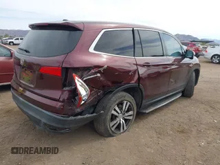 2016 Honda Pilot EX-L with VIN 5FNYF5H57GB028307, listed as a IAAI auction lot 41925711 with 125,118 mi miles and . Bid and sale history available at DreamBid. Image 4.