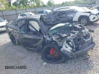2020 Dodge Charger Scat Pack z VIN 2C3CDXGJ3LH244464, wystawiony jako IAAI lot #42257220 z przebiegiem Nie podano mil oraz . Historia ofert i sprzedaży dostępna na DreamBid. Obrazek 1.