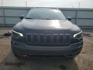 2019 Jeep Cherokee Trailhawk z VIN 1C4PJMBXXKD471338, wystawiony jako Copart lot #59880765 z przebiegiem 59 546 mil mil oraz Szkoda całkowita • Salvage title. Historia ofert i sprzedaży dostępna na DreamBid. Obrazek 5.