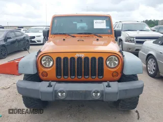 2011 Jeep Wrangler Sport with VIN 1J4AA2D1XBL579882, listed as a IAAI auction lot 42122353 with 153,885 mi miles and . Bid and sale history available at carsss.com. Image 12.