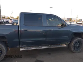 2018 Chevrolet Silverado 1500 LT with VIN 3GCPCRECXJG431472, listed as a IAAI auction lot 41825820 with 118,452 mi miles and . Bid and sale history available at DreamBid. Image 14.