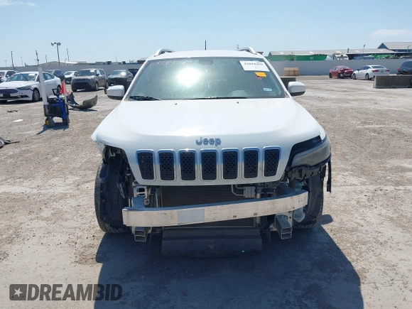 2019 Jeep Cherokee Latitude with VIN 1C4PJLCB9KD285111, listed as a IAAI auction lot 42044469 with 123,947 mi miles and . Bid and sale history available at DreamBid. Image 13.