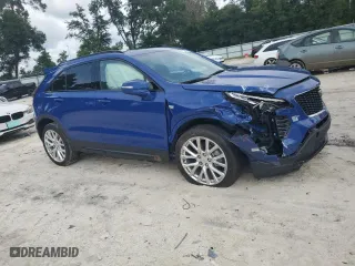 2023 Cadillac XT4 FWD Sport with VIN 1GYFZER43PF111131, listed as a Copart auction lot 71765404 with 524 mi miles and Salvage Title. Bid and sale history available at carsss.com. Image 4.