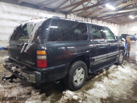 2004 Chevrolet Suburban LT with VIN 1GNFK16Z24J165975, listed as a Copart auction lot 79915414 with 302,930 mi miles and Salvage Title. Bid and sale history available at carsss.com. Image 3.