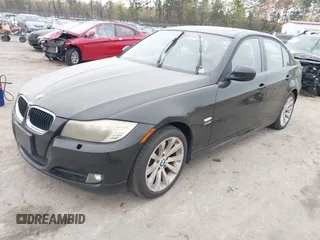 2011 BMW 3 Series 328i xDrive with VIN WBAPK7C55BA818598, listed as a IAAI auction lot 41968173 with 165,683 mi miles. Bid and sale history available at carsss.com. Image 2.