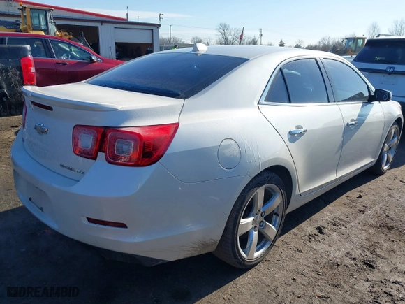 2014 Chevrolet Malibu LTZ with VIN 1G11J5SX0EF289841, listed as a IAAI auction lot 41669908 with 233,599 mi miles. Bid and sale history available at carsss.com. Image 4.
