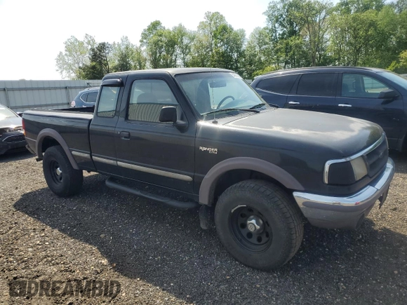 1997 Ford Ranger XLT with VIN 1FTDR15X9VTA24287, listed as a Copart auction lot 54923325 with 148,921 mi miles and Salvage Title. Bid and sale history available at DreamBid. Image 4.
