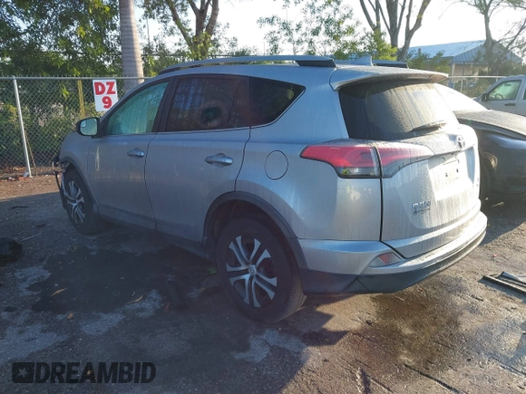2017 Toyota RAV4 LE with VIN 2T3BFREV1HW607984, listed as a IAAI auction lot 41878970 with 136,941 mi miles and . Bid and sale history available at DreamBid. Image 3.
