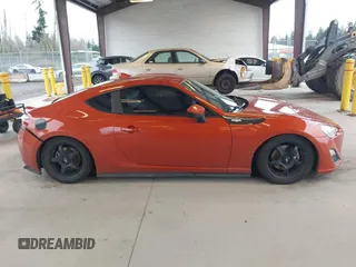 2015 Scion FR-S with VIN JF1ZNAA17F8703357, listed as a IAAI auction lot 41924644 with 62,023 mi miles. Bid and sale history available at carsss.com. Image 13.