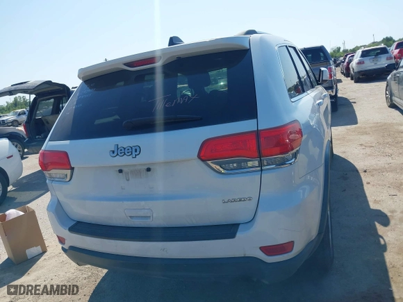 2014 Jeep Grand Cherokee Laredo with VIN 1C4RJEAG2EC107005, listed as a IAAI auction lot 41970670 with 299,211 mi miles. Bid and sale history available at carsss.com. Image 16.