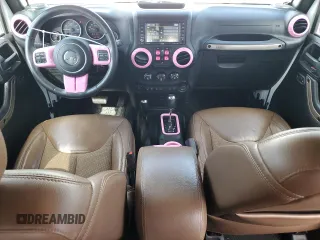 2016 Jeep Wrangler Unlimited Sahara with VIN 1C4BJWEG1GL328101, listed as a Copart auction lot 52754865 with 65,106 mi miles and Salvage title. Bid and sale history available at DreamBid. Image 8.