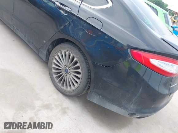 2016 Ford Fusion Titanium with VIN 3FA6P0K91GR220099, listed as a IAAI auction lot 41947778 with 140,252 mi miles and . Bid and sale history available at DreamBid. Image 17.