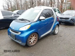 2009 Smart fortwo Passion z VIN WMEEK31X39K225478, wystawiony jako IAAI lot #41510522 z przebiegiem Nie podano mil oraz . Historia ofert i sprzedaży dostępna na DreamBid. Obrazek 2.