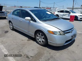 2006 Honda Civic LX with VIN 2HGFA16506H523122, listed as a IAAI auction lot 42539713 with 151,199 mi miles and . Bid and sale history available at DreamBid. Image 1.