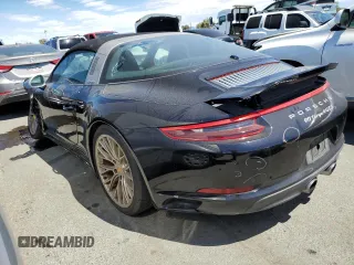 2019 Porsche 911 4S with VIN WP0BB2A99KS126019, listed as a Copart auction lot 60111334 with 25,012 mi miles and Salvage Title. Bid and sale history available at carsss.com. Image 2.