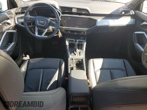 2020 Audi Q3 Premium with VIN WA1AECF30L1023652, listed as a Copart auction lot 57148915 with 69,621 mi miles and Salvage title. Bid and sale history available at DreamBid. Image 8.