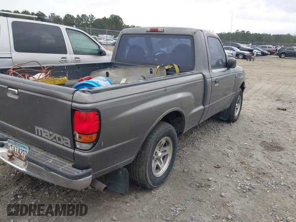 2000 Mazda B-Series Truck SX with VIN 4F4YR12C9YTM23599, listed as a IAAI auction lot 41393276 with 232,789 mi miles and . Bid and sale history available at DreamBid. Image 4.