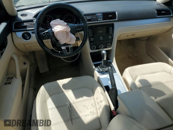 2012 Volkswagen Passat SE с VIN 1VWBH7A34CC028645, выставлен на аукционе Copart как лот 69521444 с пробегом 161 123 миль миль и Списание • Salvage title. История ставок и продаж доступна на DreamBid. Изображение 8.