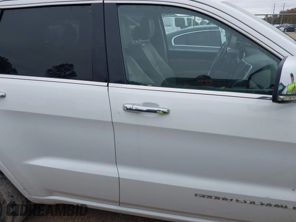 2014 Jeep Grand Cherokee Overland with VIN 1C4RJECG4EC543092, listed as a IAAI auction lot 40981315 with 149,096 mi miles. Bid and sale history available at carsss.com. Image 14.