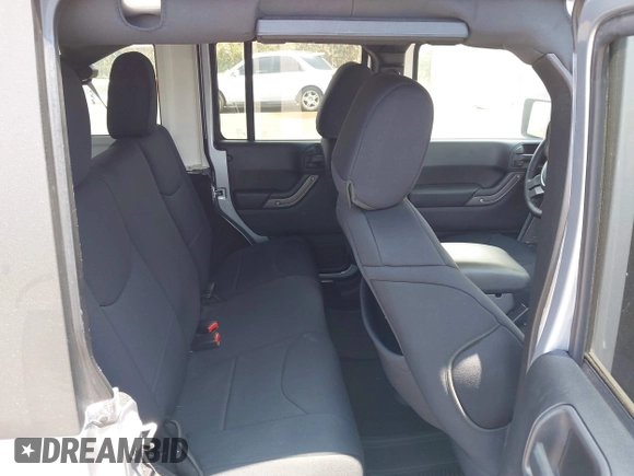 2016 Jeep Wrangler Unlimited Freedom with VIN 1C4BJWDG7GL109953, listed as a IAAI auction lot 42140111 with 24,570 mi miles and . Bid and sale history available at DreamBid. Image 8.