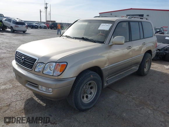 2000 Lexus LX 470 with VIN JT6HT00W0Y0098917, listed as a IAAI auction lot 41937661 with 180,980 mi miles and . Bid and sale history available at DreamBid. Image 17.