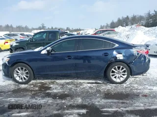 2016 Mazda 6 i Sport with VIN JM1GJ1U53G1407290, listed as a IAAI auction lot 41579668 with 131,527 mi miles and . Bid and sale history available at DreamBid. Image 14.