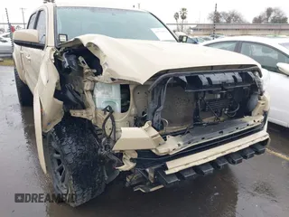 2016 Toyota Tacoma SR5 with VIN 3TMDZ5BN3GM003351, listed as a IAAI auction lot 41721932 with 100,774 mi miles and . Bid and sale history available at DreamBid. Image 6.