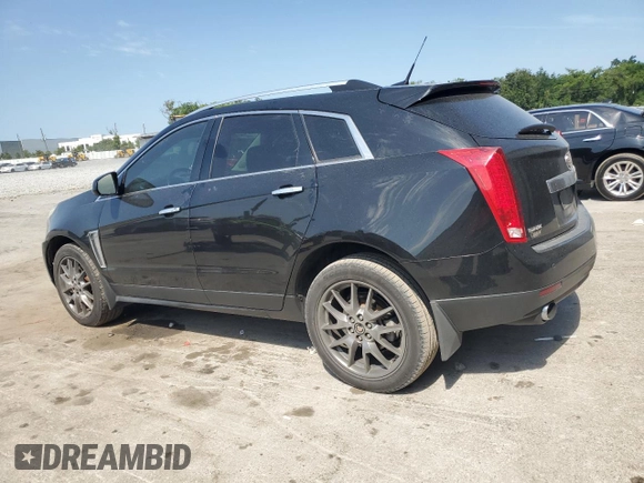 2014 Cadillac SRX Premium Collection with VIN 3GYFNDE35ES591071, listed as a Copart auction lot 57891265 with 134,560 mi miles and Salvage title. Bid and sale history available at DreamBid. Image 2.