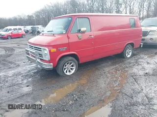 1990 Chevrolet Chevy Van z VIN 2GCEG25H9L4147291, wystawiony jako IAAI lot #41468176 z przebiegiem Nie podano mil oraz . Historia ofert i sprzedaży dostępna na DreamBid. Obrazek 2.