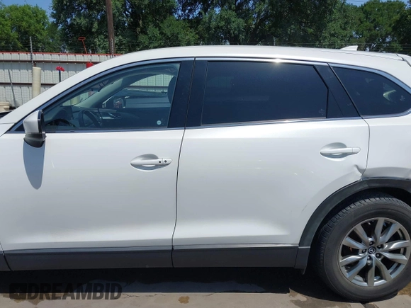 2019 Mazda CX-9 Touring z VIN JM3TCBCY2K0300702, wystawiony jako IAAI lot #42194050 z przebiegiem 98 247 mil mil oraz . Historia ofert i sprzedaży dostępna na DreamBid. Obrazek 14.