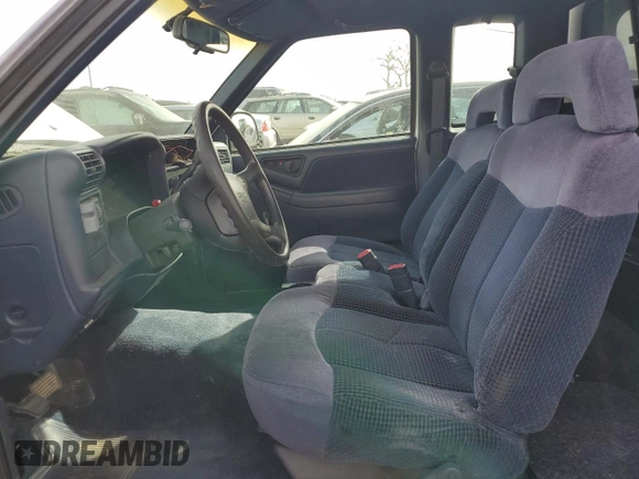 1997 GMC Sonoma SLS with VIN 1GTCS19X7V8517253, listed as a Copart auction lot 43829035 with 102,976 mi miles and Salvage Title. Bid and sale history available at DreamBid. Image 7.