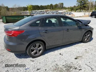 2018 Ford Focus SE with VIN 1FADP3FE9JL278340, listed as a Copart auction lot 50839345 with 83,187 mi miles and Salvage title. Bid and sale history available at DreamBid. Image 3.