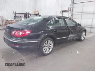 2012 Volkswagen CC Sport PZEV with VIN WVWMP7AN8CE537805, listed as a IAAI auction lot 41847051 with 147,095 mi miles. Bid and sale history available at carsss.com. Image 4.