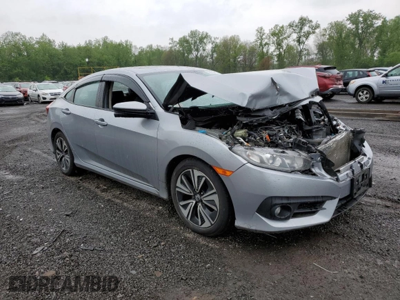 2017 Honda Civic EX-L z VIN 19XFC1F74HE209787, wystawiony jako Copart lot #56352415 z przebiegiem 130 264 mil mil oraz Szkoda całkowita • Salvage title. Historia ofert i sprzedaży dostępna na DreamBid. Obrazek 4.