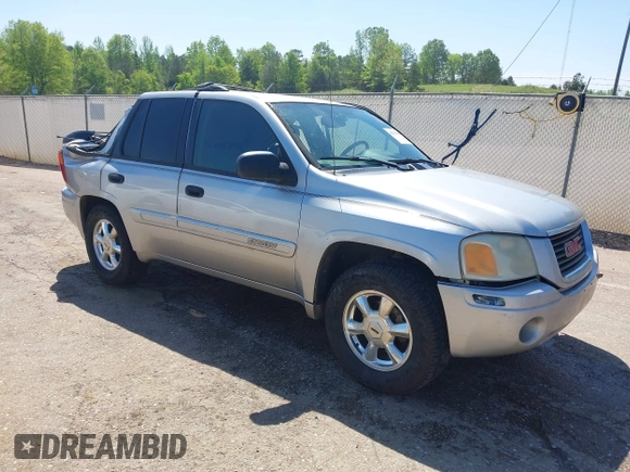 2004 GMC Envoy SLE with VIN 1GKDS13S242420100, listed as a IAAI auction lot 41963800 with 341,395 mi miles and . Bid and sale history available at DreamBid. Image 1.