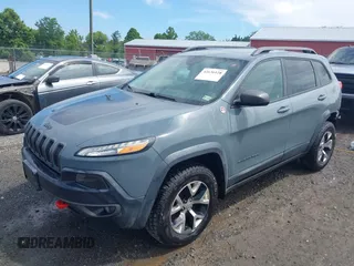 2014 Jeep Cherokee Trailhawk z VIN 1C4PJMBS4EW236950, wystawiony jako IAAI lot #42636128 z przebiegiem 170 491 mil mil oraz . Historia ofert i sprzedaży dostępna na DreamBid. Obrazek 2.